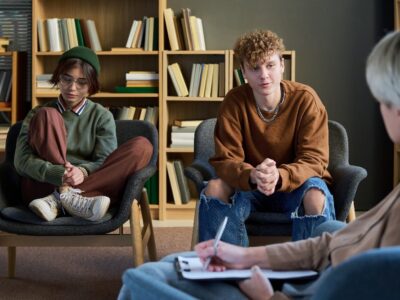 teens speaking to counselor